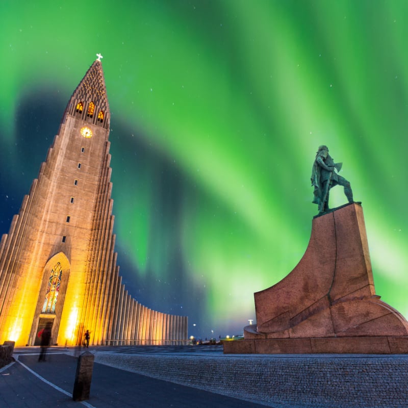 aurora borealis above hallgrimskirkja church in central of reykjavik city in Iceland