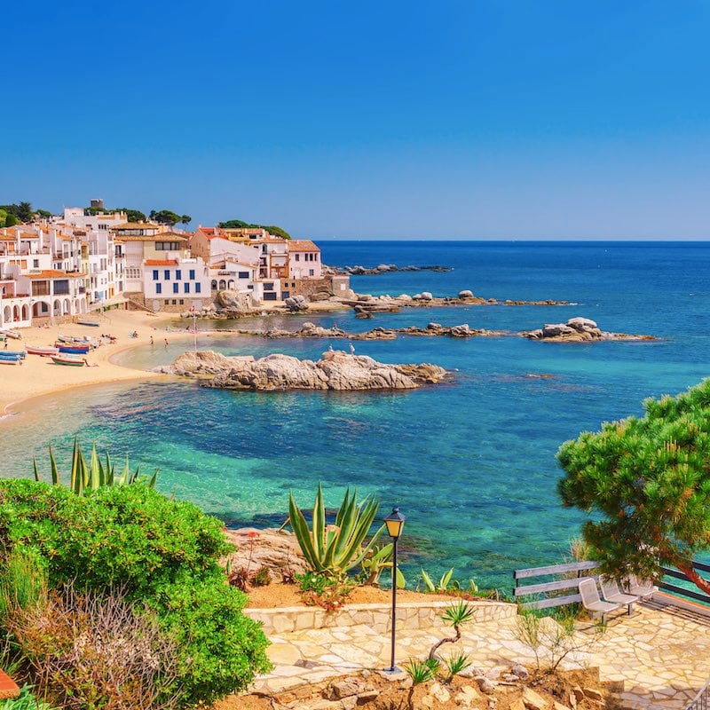 aerial view of Costa Brava beach and coastline during the day, gorgeous beach near Barcelona, Spain.