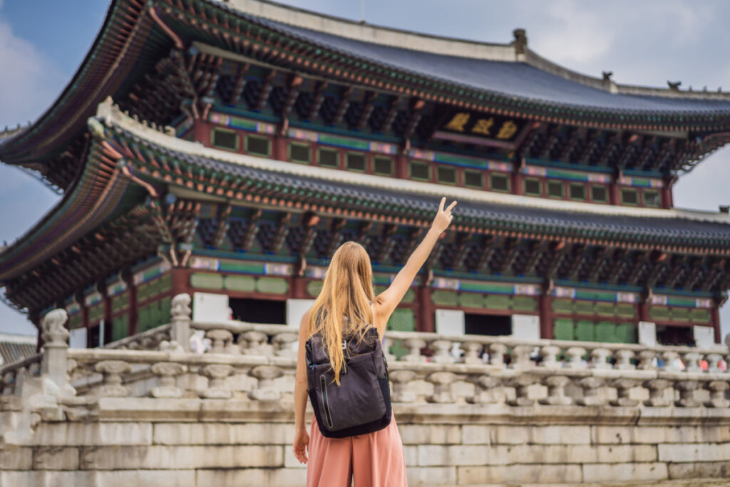 female solo traveler at korean palace