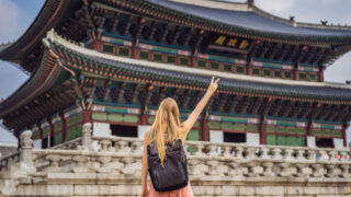 female solo traveler at korean palace