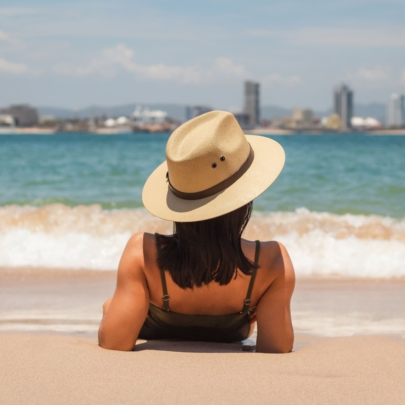 Young Woman Lying At The Beach In Mazatlan, Sinaloa, Mexico, Pacific Coast