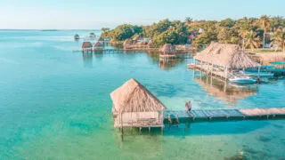 Aerial View Of Couple Embracing On A Pier In Lake Bacalar, Bacalar, Quintana Roo, Mexico