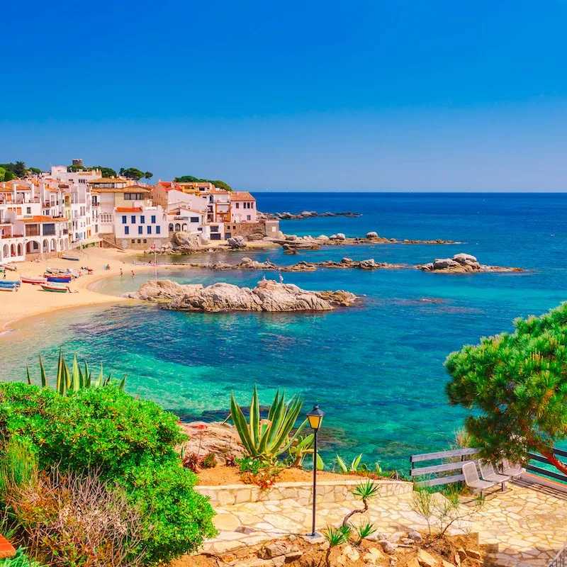 aerial view of Costa Brava beach and coastline during the day, gorgeous beach near Barcelona, Spain.
