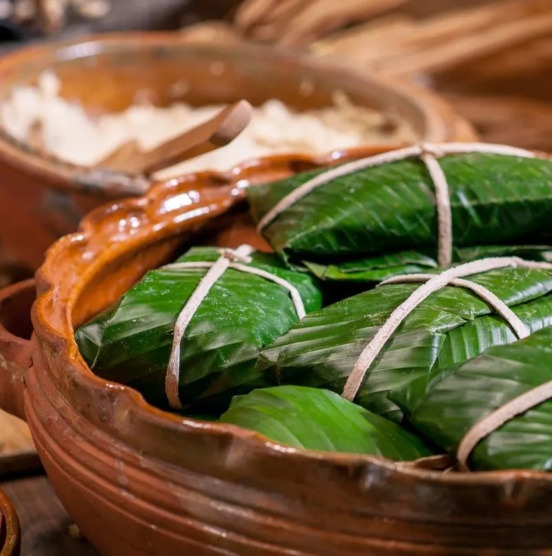bowl of green tamales