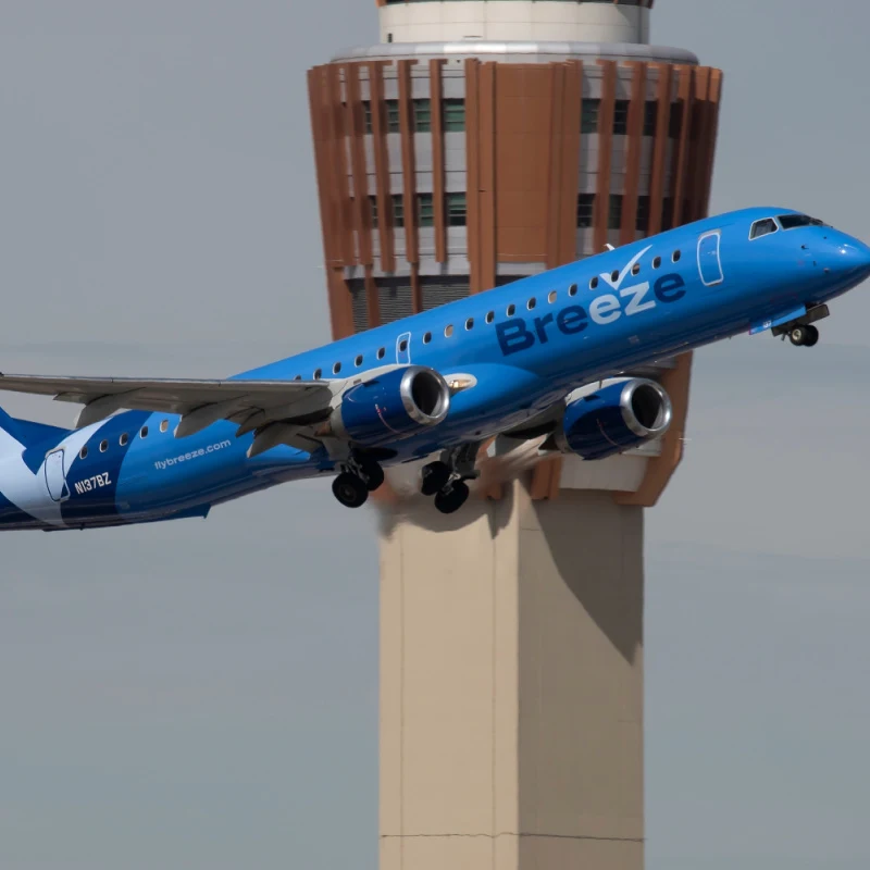 breeze airways plane taking off