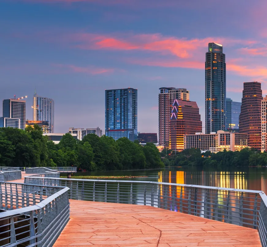 walking bridge with skyline in the background