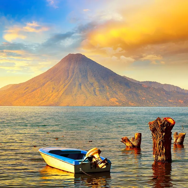 Beatiful sunset at the lake Atitlan near the volcano in Guatemala.