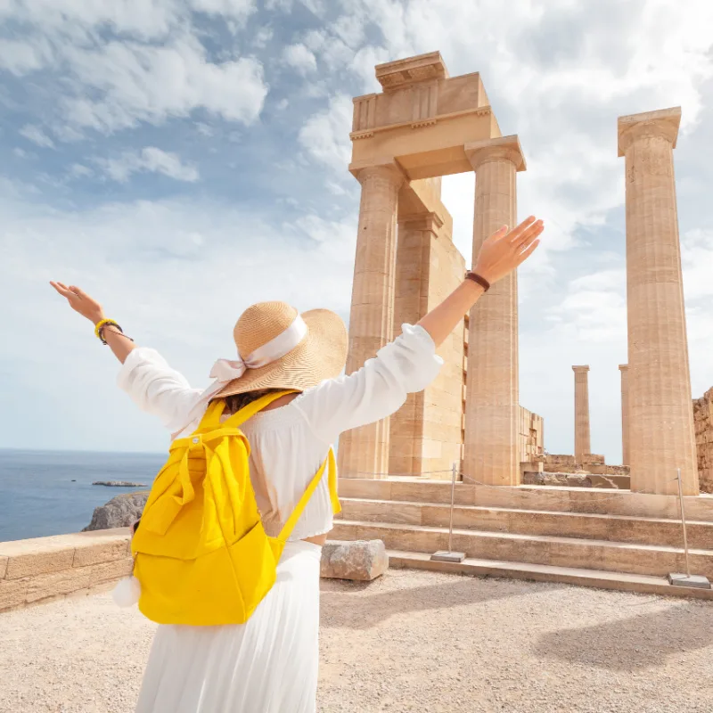 woman enjoying Lindos Acropolis, Greece
